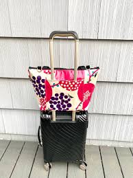 Travel Smart with a Tote Featuring a Trolley Sleeve